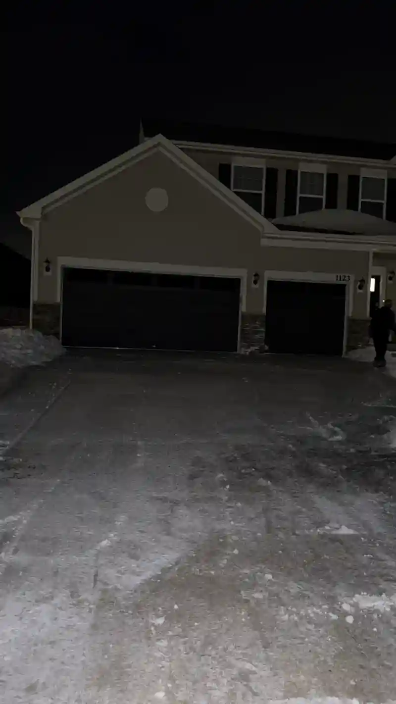Large driveway cleared after snow removal